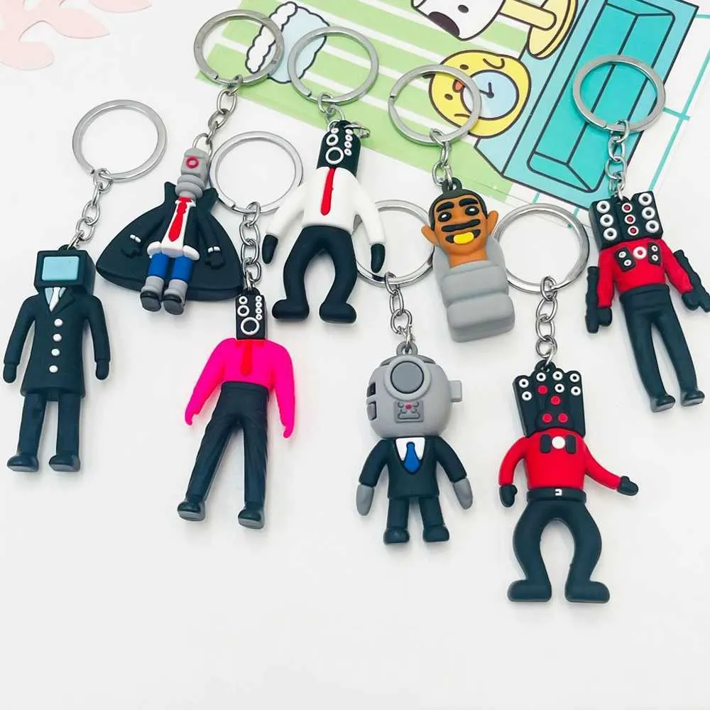 Plush keychains grappige skibidi toiletten sleutelhanger creatieve cartoon sleutelhanging voor mannen dames tas hangers anime perifere geschenken t240506