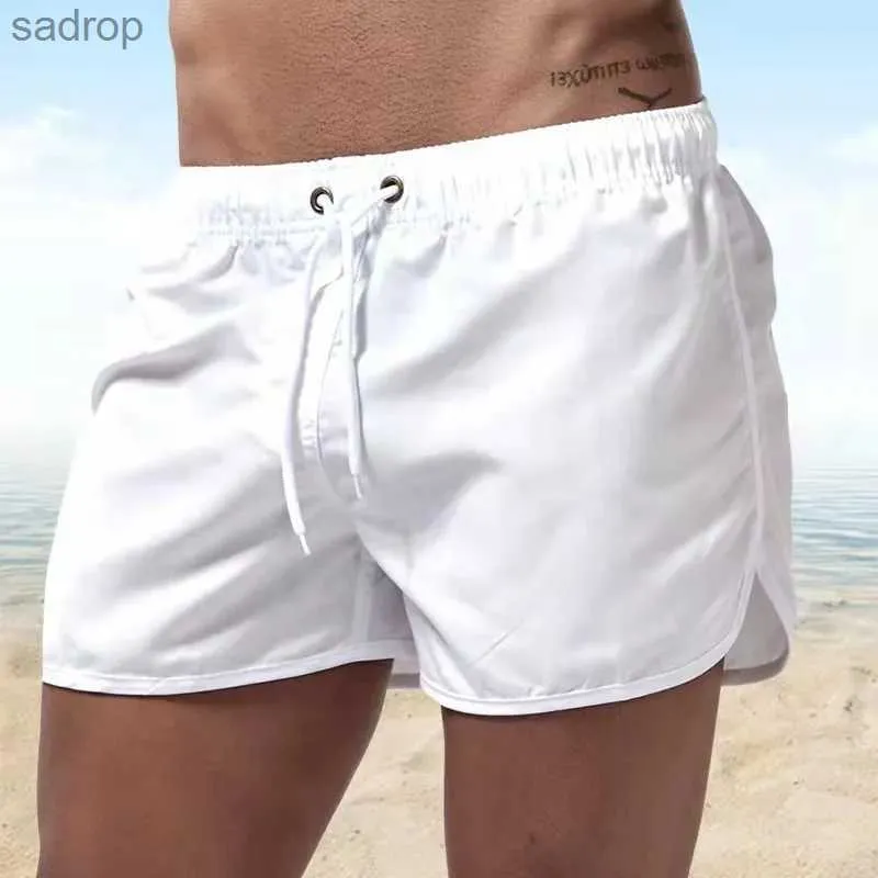 Menina de banho masculina 2021 Summer masculino shorts de natação Terno da praia Terno de natação sexy Magia massaceira de natação de baixa cintura de traje de praia respirável xw