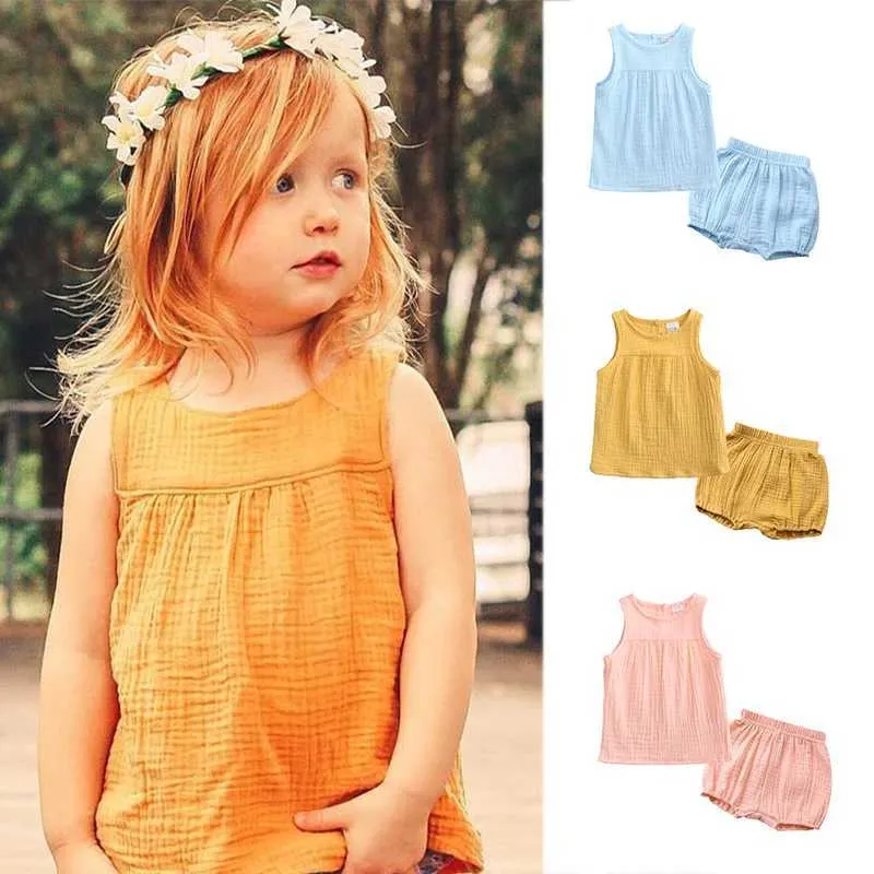 Ensembles de vêtements 2024 NOUVEAU COTTON LIGNE BÉBÉ BÉBÉ BÉRANGE BARCHES FILLES VILLES sans manches + shorts 2pcs Casual Tenues NOUVELLAGE H240507