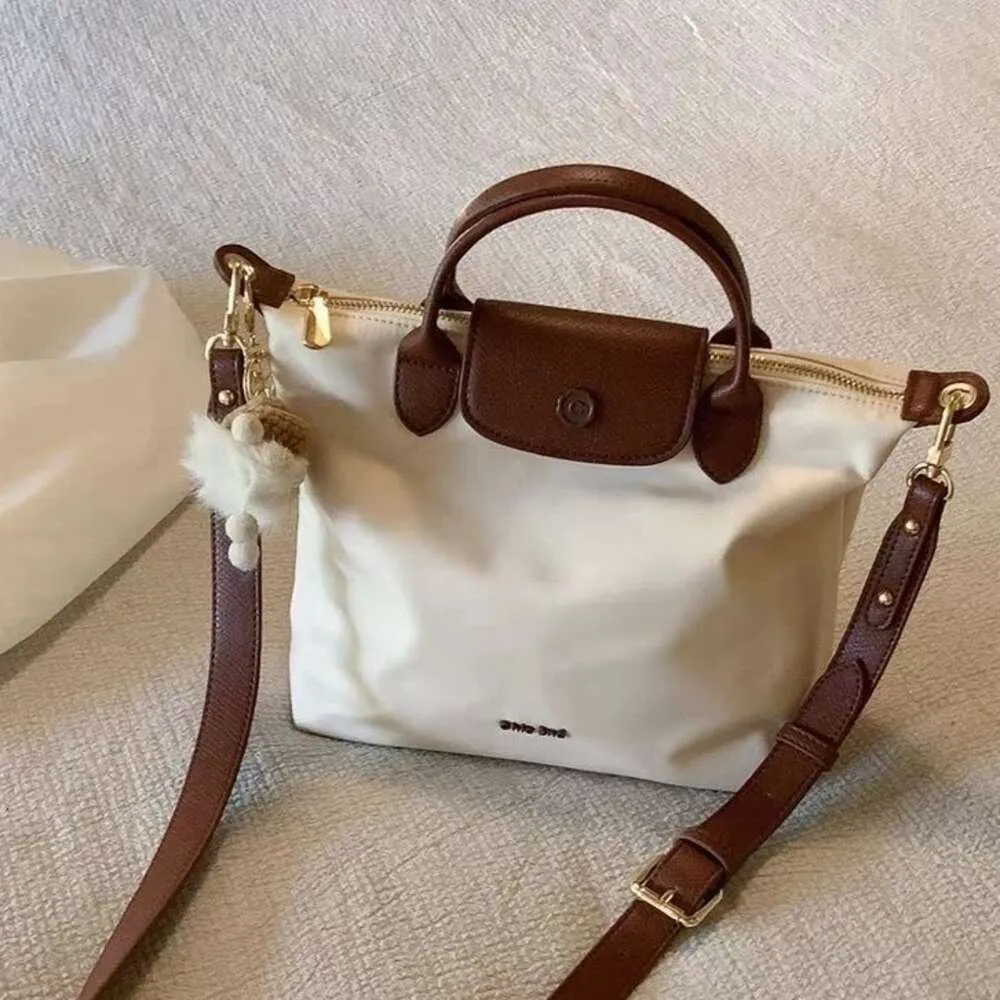 Sac à épaule mieux vendu nouveau 90% d'usine de vente directe nanfeng grand sac pour femmes Nouvelles sacs à main de poche