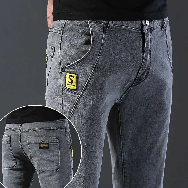 Jeans masculin mens gris jeans décontracté slim slim petit pied long pantalon denim mode polyvalent pantalon quotidien y240507