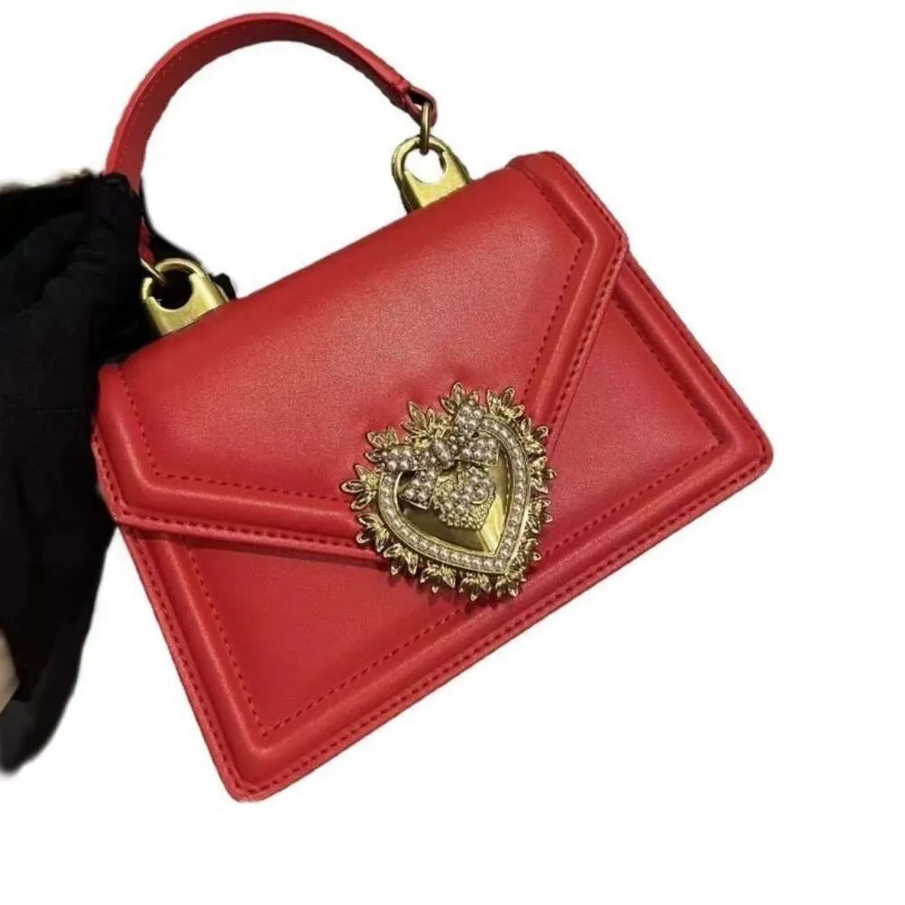 Designer damska torebka torebka mini torba na ramię z metalowym magnetycznym łańcuchem mody luksusowa skórzana torba z litego koloru
