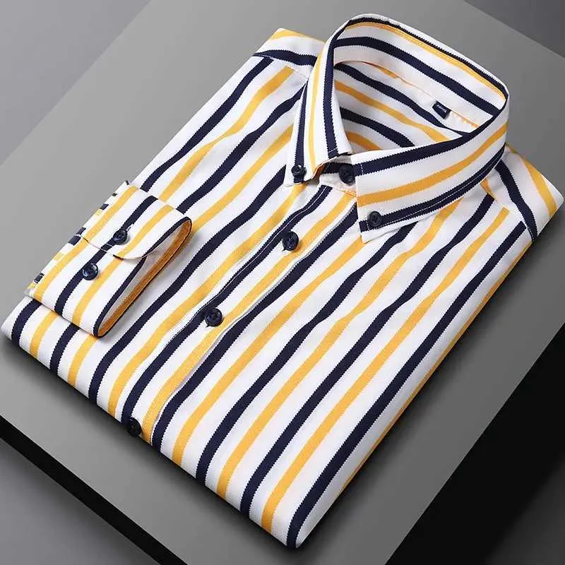 Herrklänningskjortor Mens skjorta Long Sle Spring and Summer Plaid Stripes Ing Business Casual Slim New Solid Color Thin Model D240507