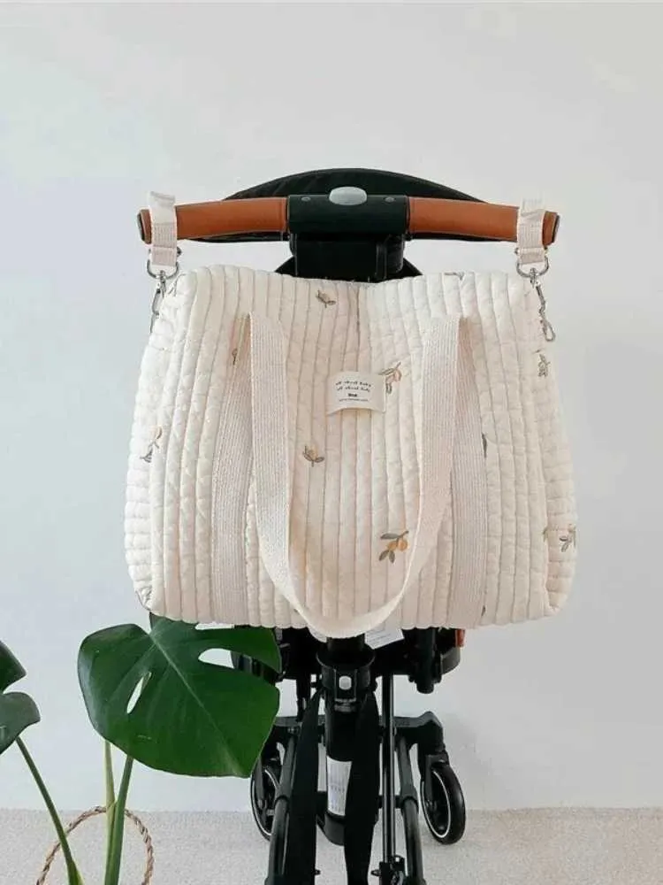 Diaper Bags Korean style newborn care diaper bag mummy shoulder bag embroidered bedding cart diaper storage organizer handbagL240502