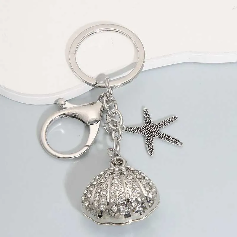 Keychains Lanyards Fashion Pearl Starfish Shell Alloy Keychain Silver Color Sea Key Chains voor het maken van handgemaakte DIY -sieradenaccessoires bevindingen