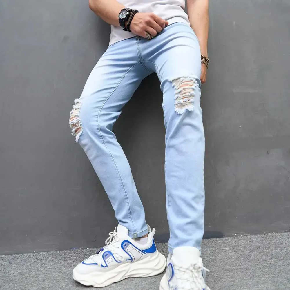 Heren jeans mannen strekken een skinny jeans gaten van verontruste heren stijlvolle broek mannelijk gescheurde potlood denim broek y240507