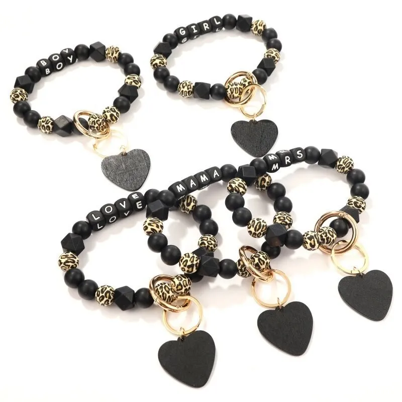 Venta de nuevo Heart de Peach Heart Black Leopard Silicone Bead Bead Chain Cadena Key Mama Letter Bags Hanging Ornaments