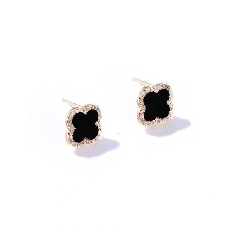 Designer de boucles d'oreille personnalisé conçoit le meilleur cadeau en argent pur argent boucles d'oreilles de trèfle noir pour les femmes avec un luxe léger et avec une camionnelle commune