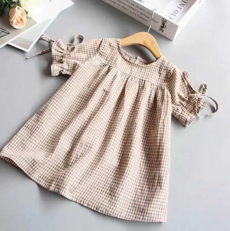 Vestidos femininos xadrez xadrez de garotas de verão nova lazer solta Blusa de baby body cuff-up camisa infantil roupas 1-5y lt020 h240507