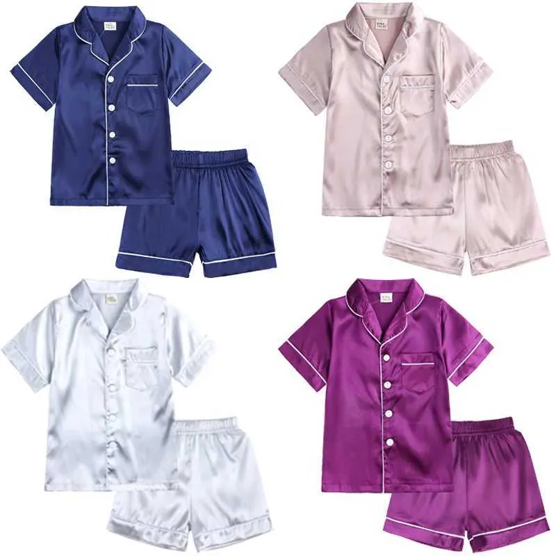 Pyjama's comfortabele zomer pyjama -sets voor jongensmeisjes zijden satijnen top+broek lange mouw stevige zijdeachtige pyjamas nachthemd kinderen slaapkleding H240507