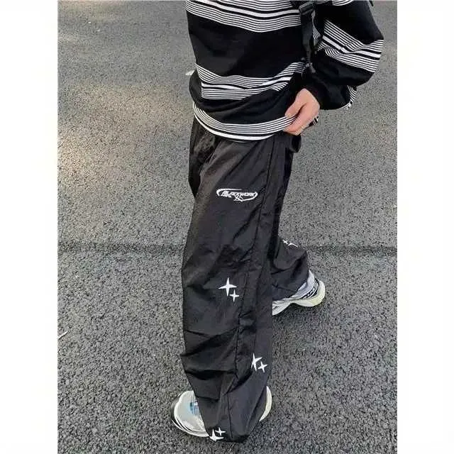 Pantalon masculin La conception originale de la Super League chinoise correspond entièrement au style de pantalon décontracté et lâche qui est le même que celui des hommes et des femmes J240507