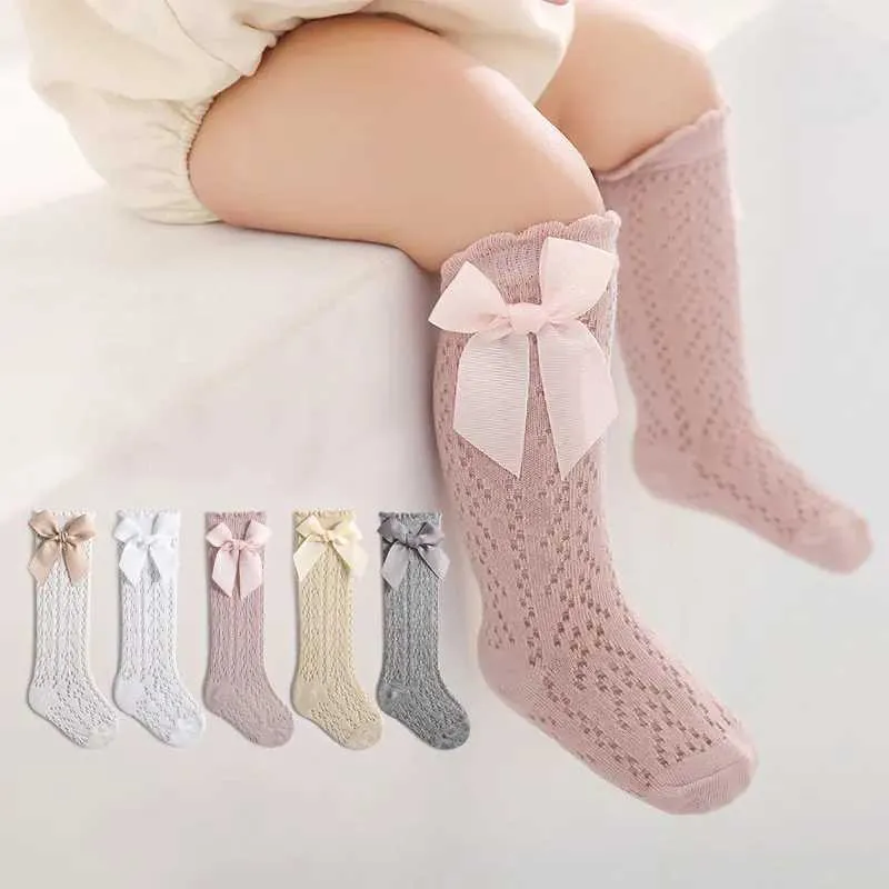 Chaussettes pour enfants mignons filles genoues hautes socks de coton coton respirant pour enfants doux chaussettes creux de nouveau-nés sans glissement