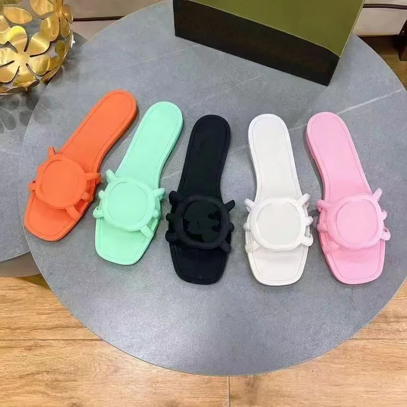 Kvinnors designer tofflor Slåsande glider gummi toffel strand sandaler sommar platt mulor gelé skript svart vit grön rosa orange vattentät lyx sandal