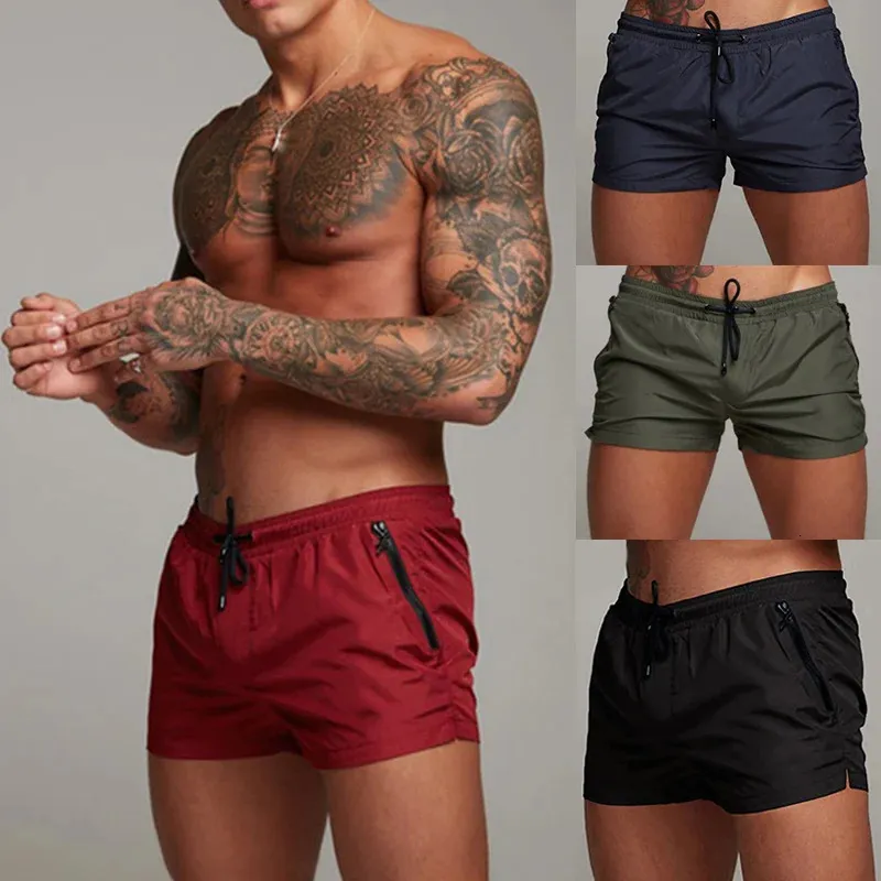 Trunks de baignade pour hommes avec poches à fermeture éclair, doublure de maille de plage d'été shorts de baignade de bain à sec rapidement des maillots de bain de maillot de bain 240508