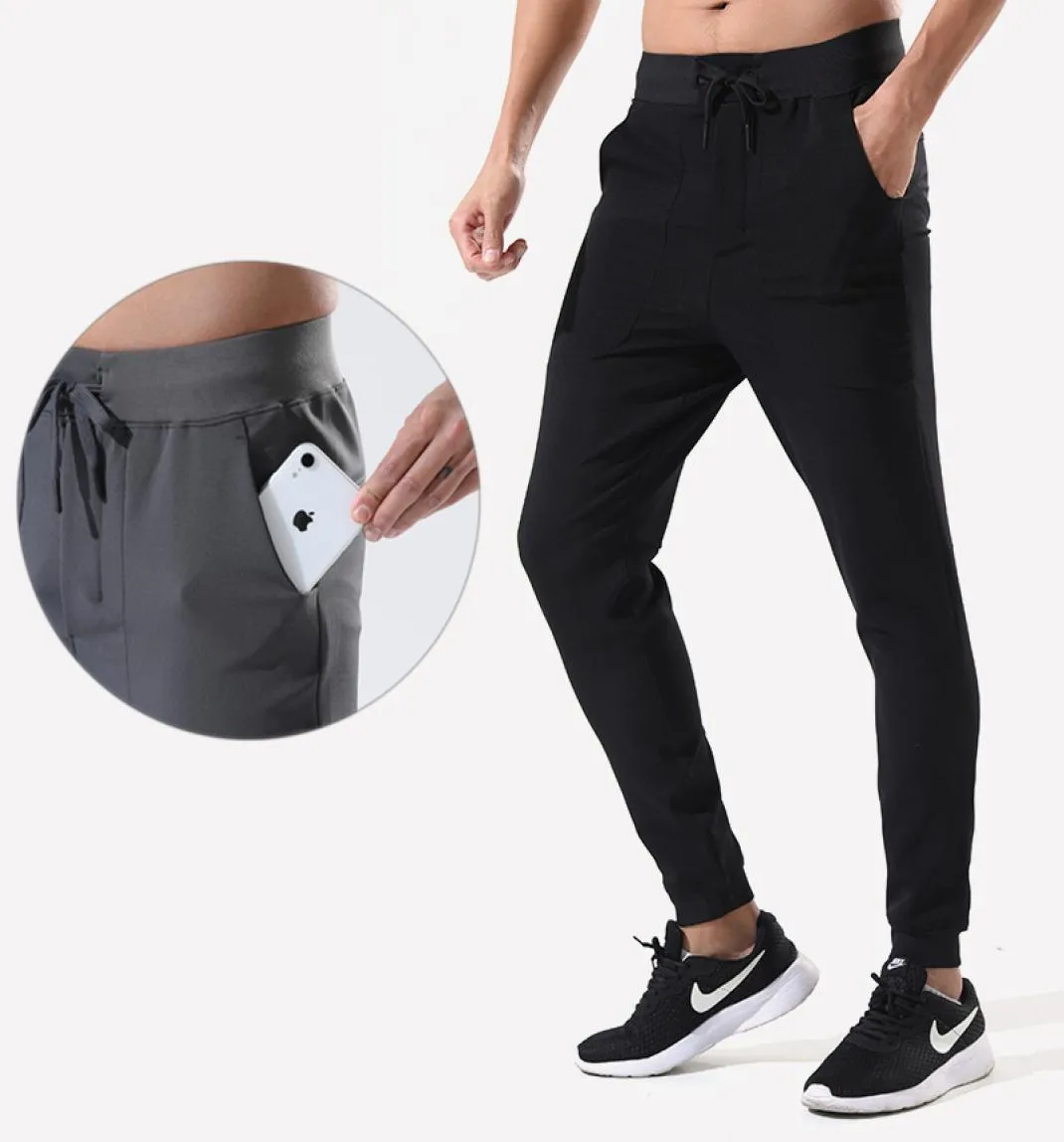 Pantalon de 9 points masculin Tendance coréenne Summer Slim Muscle Muscle de mode de fitness Trafeuille d'entraînement en fitness4413138