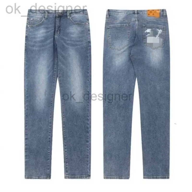 Designer män jeans vår och sommar stretch smala byxor ljus blå jeans denim byxor mens jeans designer jeans par lös mångsidiga avslappnade byxor