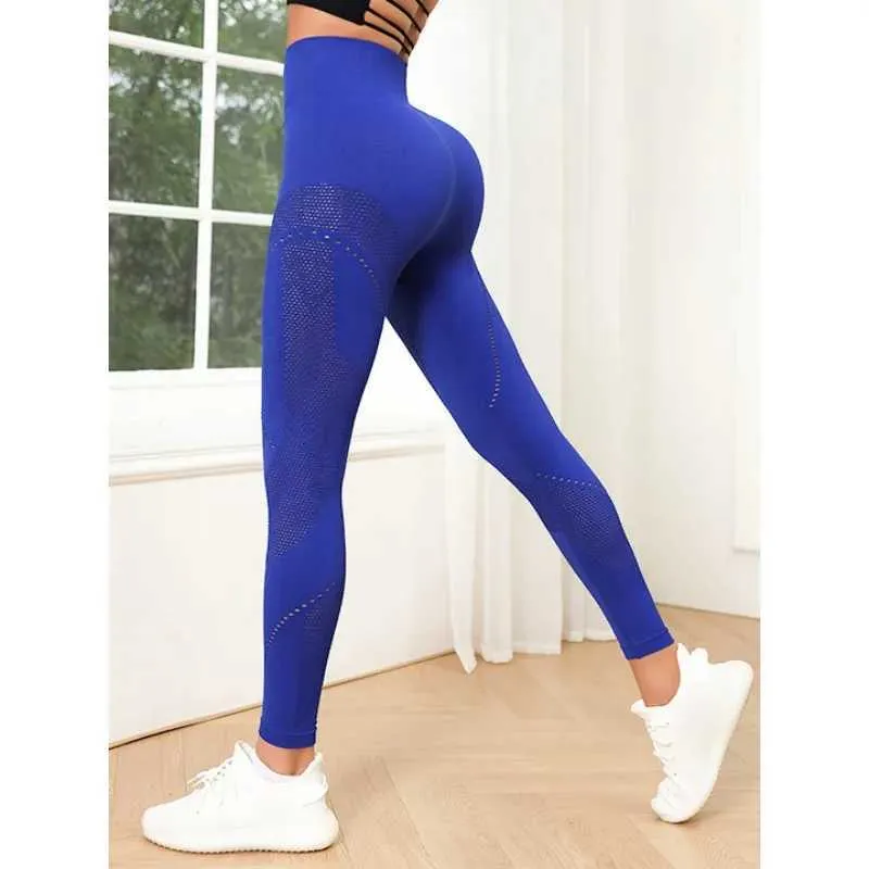 Leggings pour femmes Mesh Fitness Sous-pants sexy hauts hauts creux caches solides couleurs coulant des caisses de mode respirante y240508