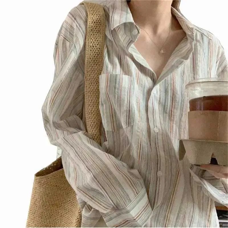 T-shirt féminin 2024 Chemise à rayures rétro pour femmes coréennes à manches longues à manches longues Bureau des femmes décontractées