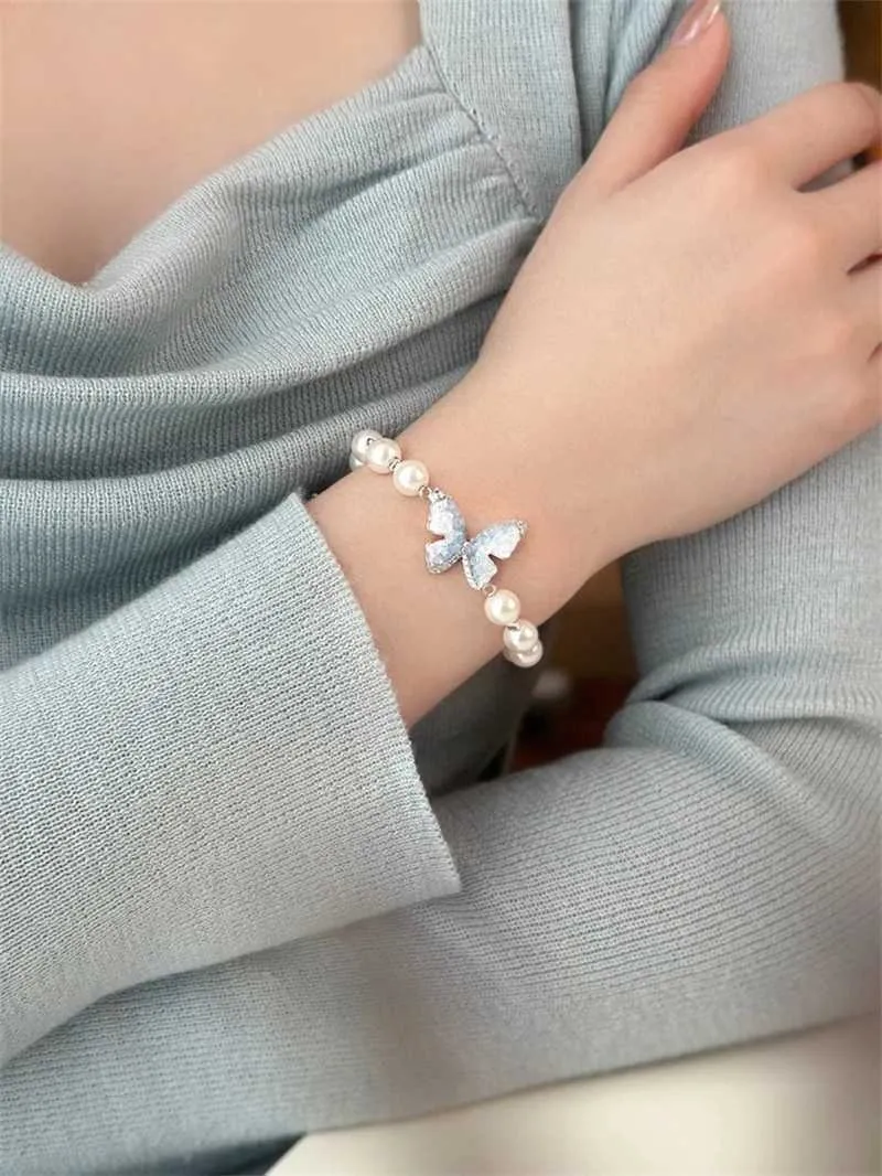 Charm Bracelets New Fashhion Blue Crystal Butterfly Pearl Bracelet Earrings Ring Necklace for Women Advanced Bilayer_voghion.com