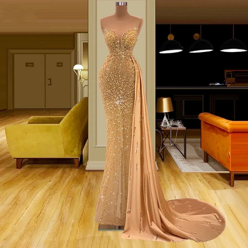 2024 Gold Mermaid Prom Dresses Sexy Crystal Prom Jurkens Jewel Neck Illusion Mouwloze Rhinestone Beads Sheer Formal Evening Jurk Open Back Back