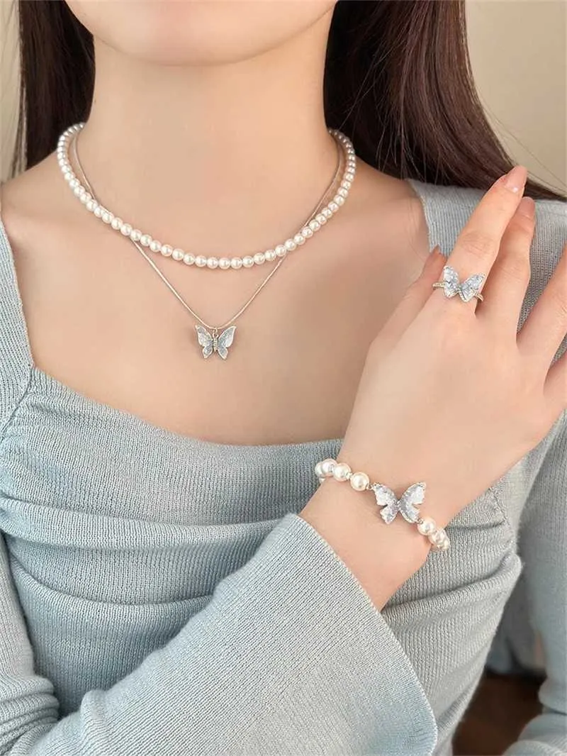 Charm Bracelets New Fashhion Blue Crystal Butterfly Pearl Bracelet Earrings Ring Necklace for Women Advanced Bilayer_voghion.com