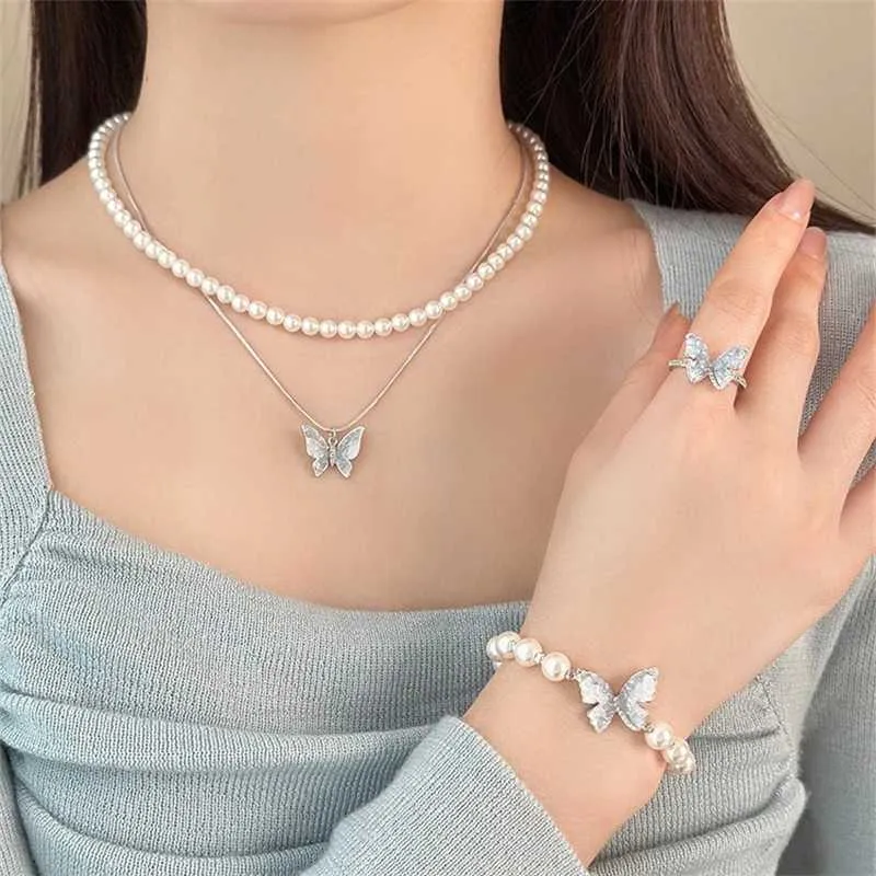Charm Bracelets New Fashhion Blue Crystal Butterfly Pearl Bracelet Earrings Ring Necklace for Women Advanced Bilayer_voghion.com