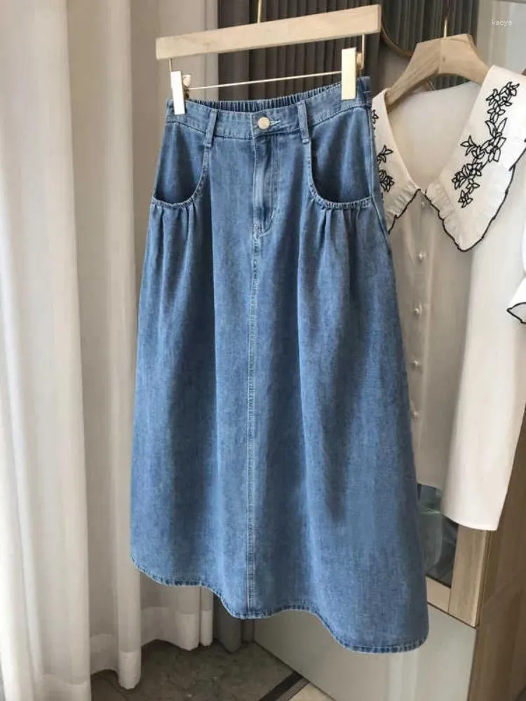 Jupes de grande taille jupe en jean taille haute taille pour les femmes été 2024 TAILLE ÉLASTIQUE MINE A-LINE POCQUE LOBÉE JEAN