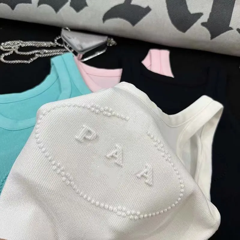 Diseñador Etiqueta de triángulo de punto de alta calidad Camisole Chaleco de moda Logotipo de alfabeto Bordado elástico Correo redondo con correa sin mangas para mujeres