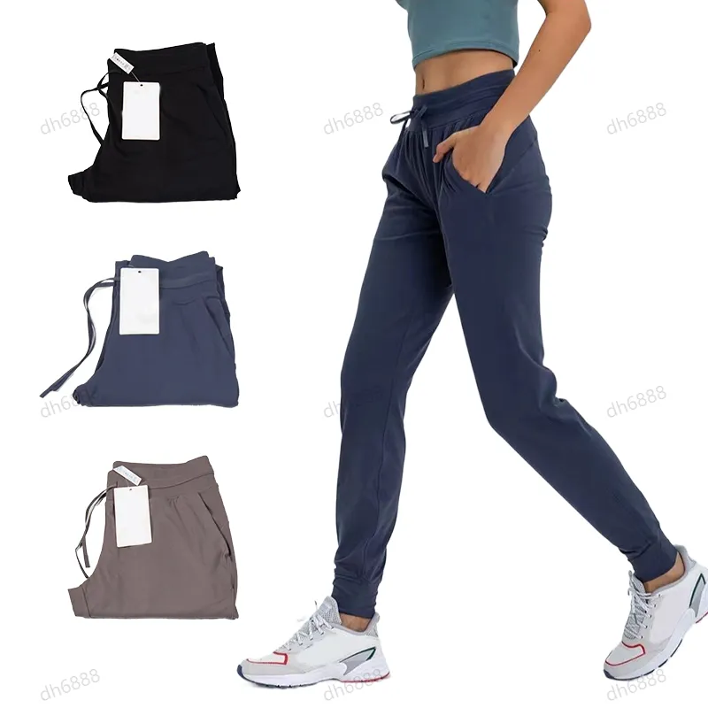 Lycra fabric Women Jogging Pants Yoga Ninth Pants Pocket Fitness Leggings weight Soft High Waist Hip Lift Elastic Casual Pants Drawstring Legs Sweatpants jump men