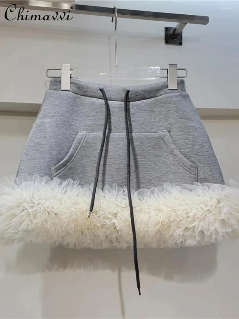 Kjolar våren 2024 American Fashion Grey Lace Mini High midja Slimming Girl Temperament Streetwear Women's Short Kirt