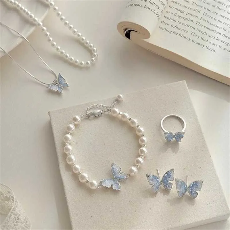 Charm Bracelets New Fashhion Blue Crystal Butterfly Pearl Bracelet Earrings Ring Necklace for Women Advanced Bilayer_voghion.com
