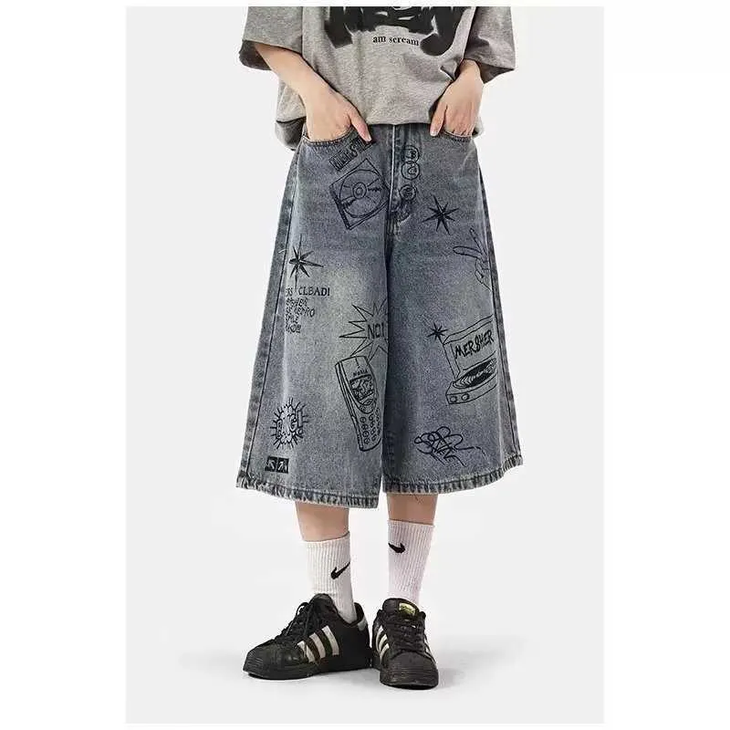 Heren shorts Kakuluo Graffiti shorts voor mannen en vrouwen zomer Amerikaans straatmodemerk losse wide been casual crop jeans H240508