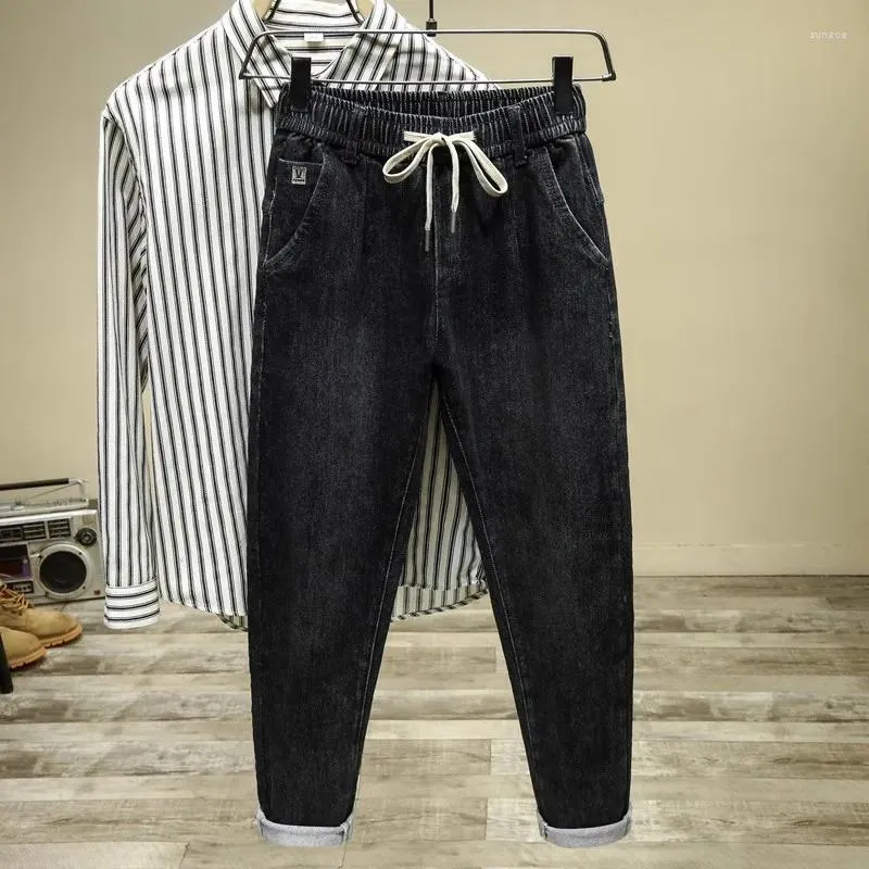 Jeans masculin harajuku mode décontracté denim décontracté ajustement pour le printemps et l'automne avec une taille de gaigne élastique pantalon cargo masculin