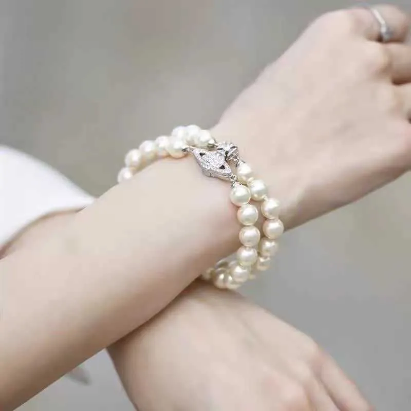 Marque Westwood Double couche Pearl Saturne Magnetic Budle Bracelet Womens Classic Diamond Planet Nail