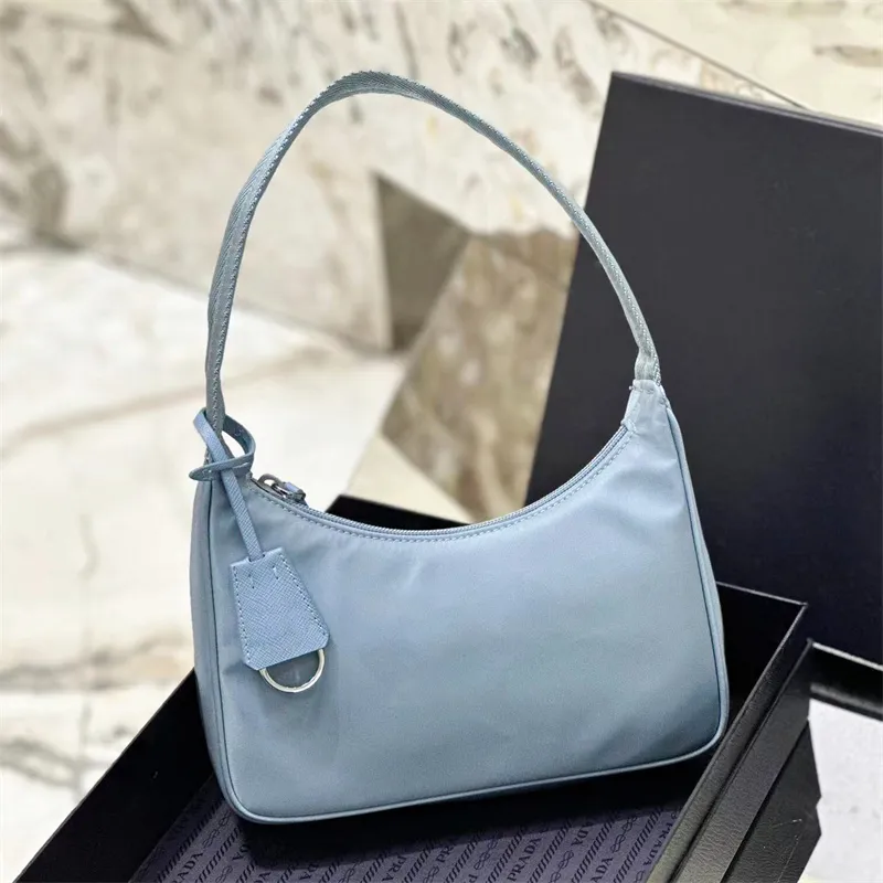 Re-edition 2000 2005 Womens Nylon Safino Bag Mens Tote Handväska Luxurys Designer Leather Crossbody Bag Fashion Lady Clutch Weekender Travel Underarm Shoulder Bags