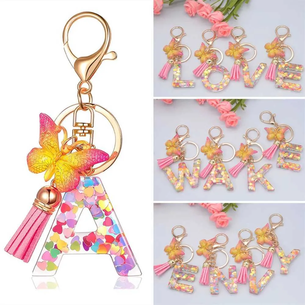 Keychains Lonyards Nouveaux exquis résine de 26 lettres porte-clés avec psychotel gradient papillon pendent clé anneau féminin de sac d'ornement accessoires cadeau j240509