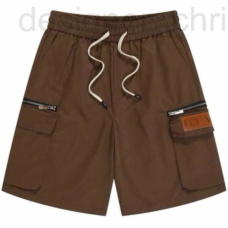 Shorts Designer maschile estate casual ragazzi sciolti shorts etichetta in pelle versatile comoda e traspirante pantaloni split fjws