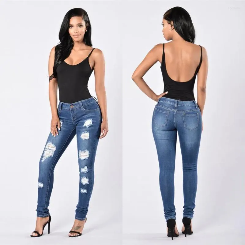 Kvinnors jeans 2024 design grossist damer sexig klocka botten staplade stretch mager plus size flare denim byxor rippade kvinnor