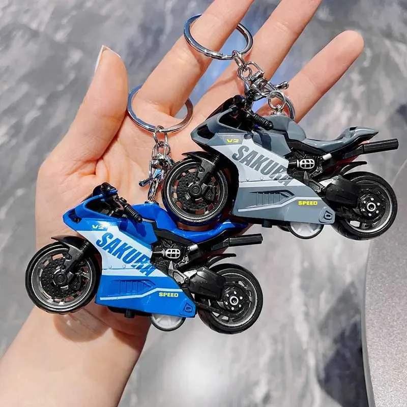 Keychains Lanyards Mini Clockwork Motorcycle Keychain Exit Motorfietsraces Model Keychain Hanger Creatieve sieraden Key Decoratie Klein speelgoed J240509