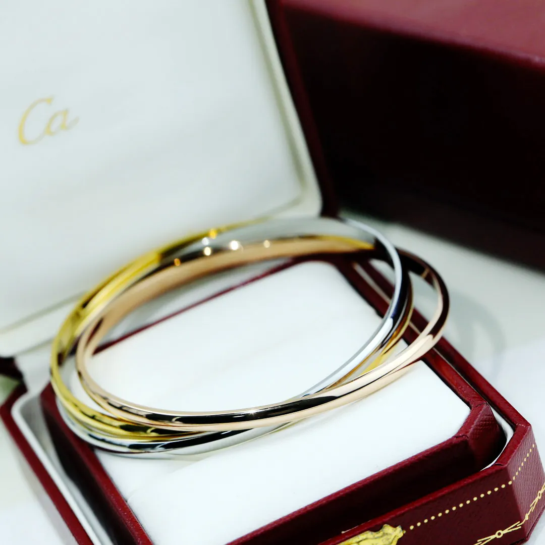 Bracciale designer Bracciale a triplo anello oro Bracciale designer di alta qualità in acciaio inossidabile Tricolor Bracciale per donne per donne Gioielli per matrimoni di lusso 007