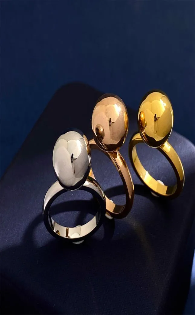 Ny glansig bolldesign Simple Fashion Ring Titanium Steel Par Hela smycken6784434
