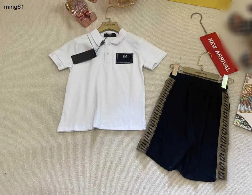 Brand Baby Tracksuits Summer Boys Polo Set Taille 90-140 cm Kids Designer Clothes T-shirts and Logo Striped Patchwork Shorts 24mai