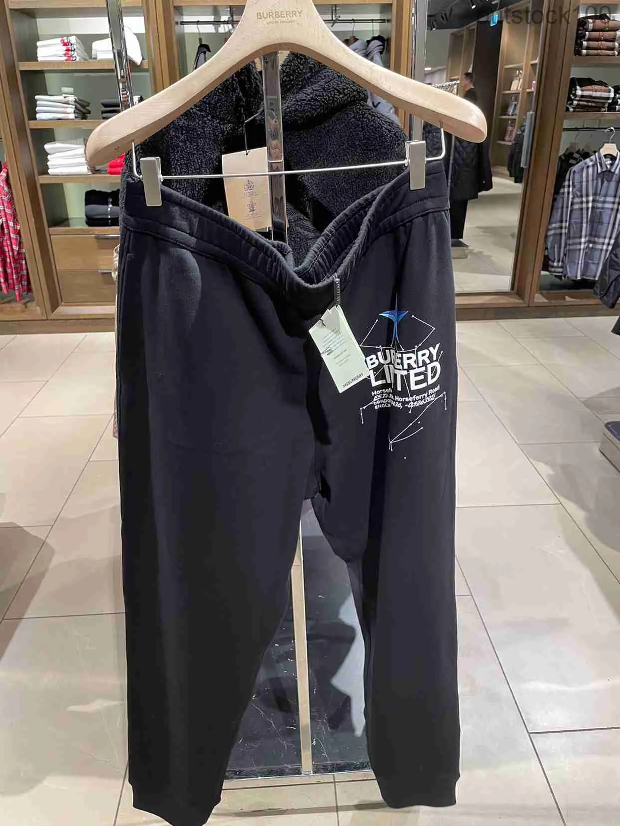 Senior Specialty armazena a qualidade Buurberlyes calças de guarda casual feminino com calças de padrão de céu estrelado 80586511 com logotipo real