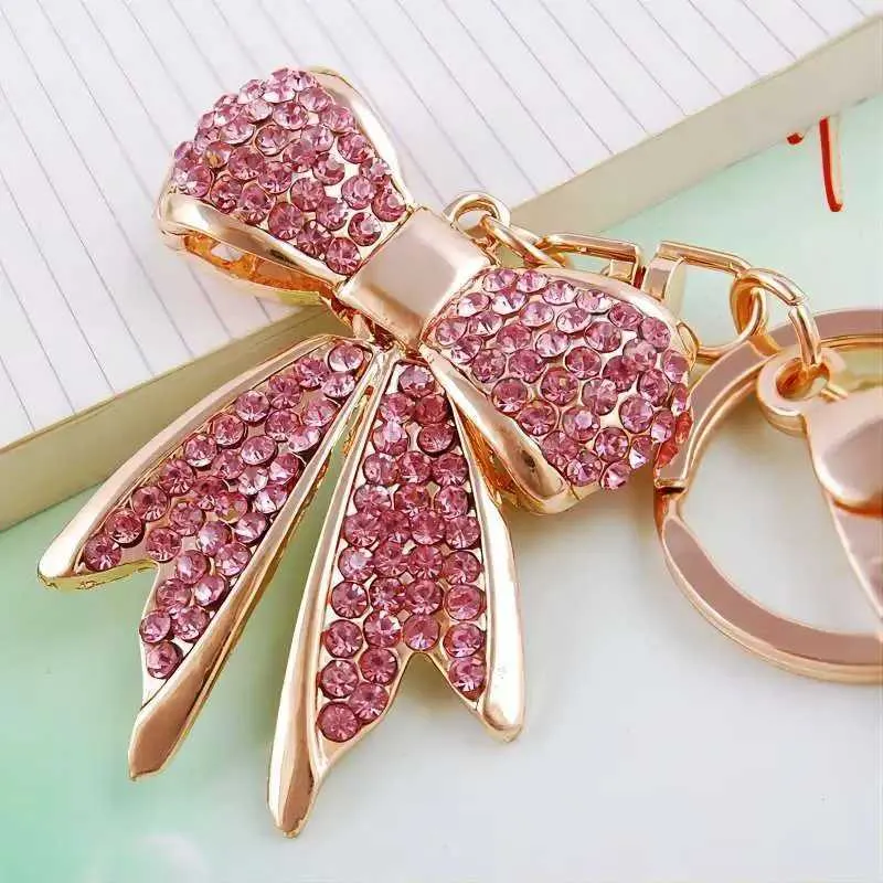 Keychains Lanyards 1 PC Spirtly Golden Color Rhinestone Bow Keychains For WomenCharms för viktiga handväskor Ryggsäckar Bästa gåvor för mamma J240509