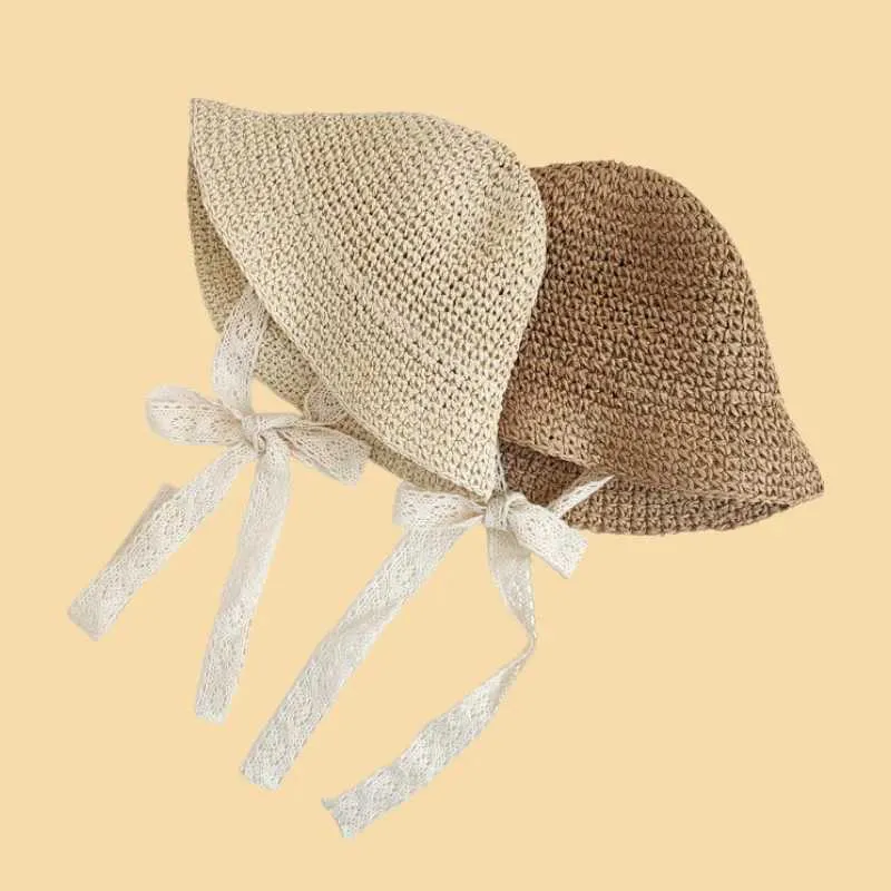 Caps chapeaux Childrens Hat 2024 Lace Lace Baby Hat Grass Bow Summer Beach Hat adapté aux enfants garçons et filles Princesse Panama D240509