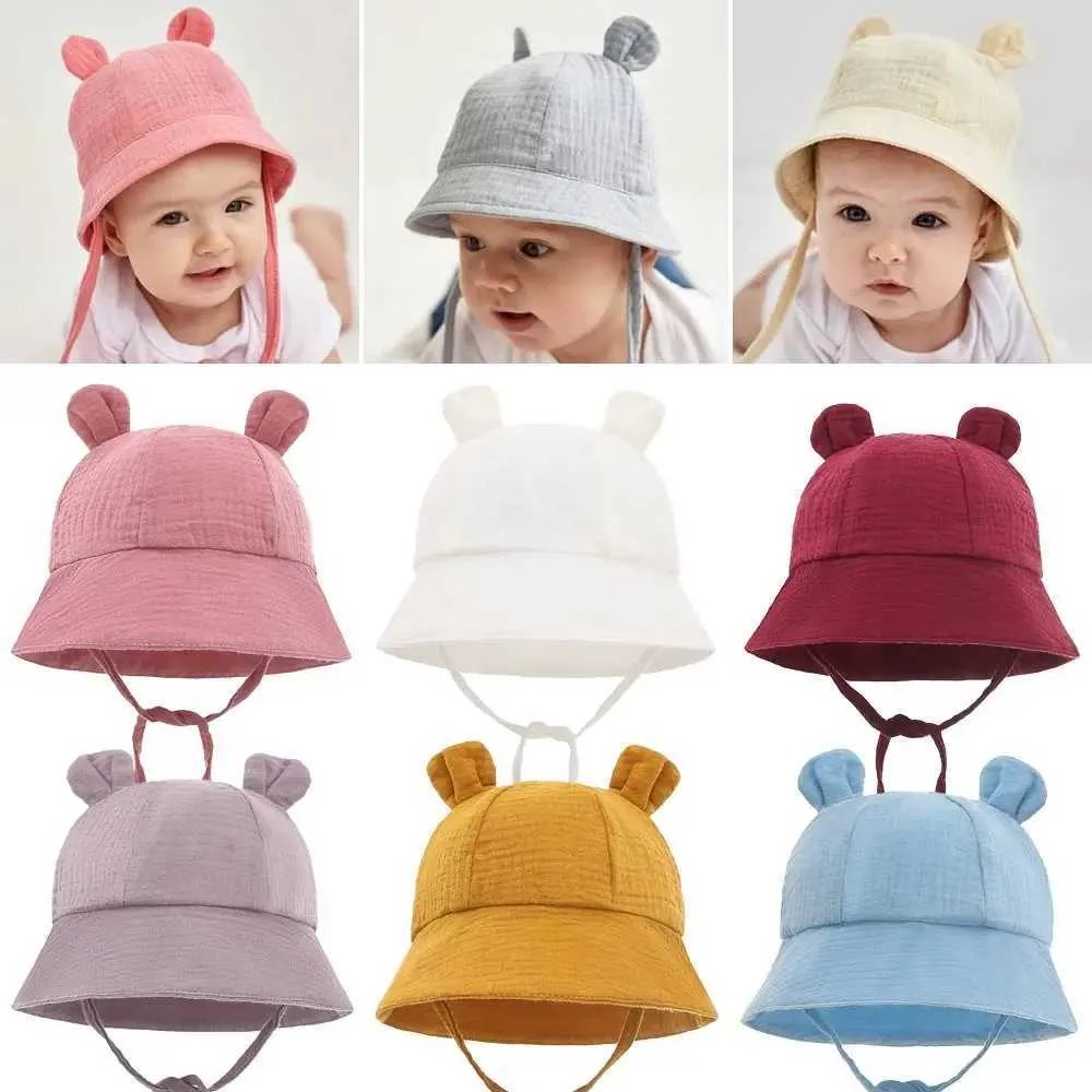 Kapaklar Şapkalar Yumuşak pamuklu bebek güneş şapkası kulaklarla sevimli tavşan yeni doğan erkek kız kova şapka yaz çocukları Toddler Panama şapkası 0 ila 12 aylık D240509