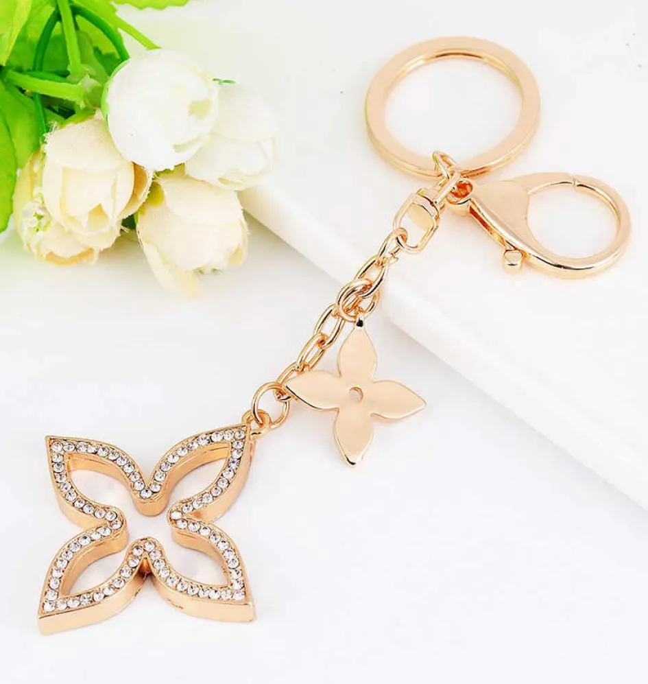 Crésivement Clover Keychain Gold Key Holder Metal Key Chain Fashion Course Courti Chaire de charme Auto Pendant Gift Whole G10193992121