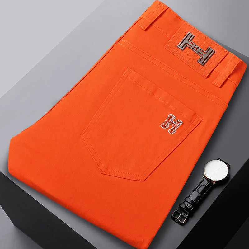 Kong Hong Sommer dünne und hellorange Jeans Herren Trendy Brand Sticked Korean Edition High End Luxus Slim Fit Small Feet Hosen