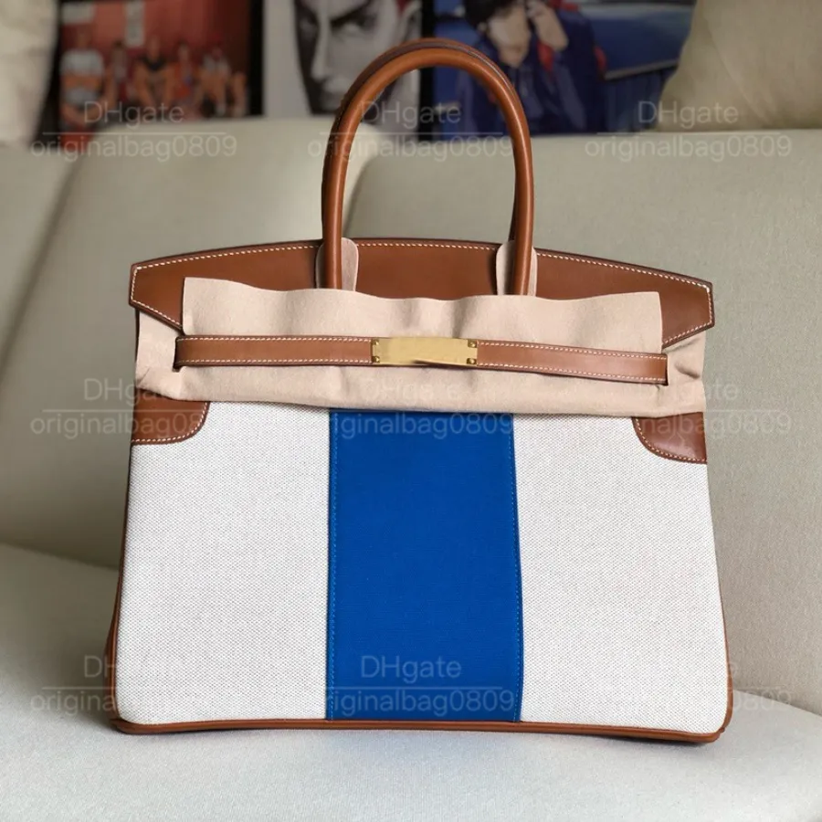 12A 1: 1 Toppkvalitetsdesigner Tygväskor Speciellt anpassade nischduk Canvas Patchwork Sadel Läder Kreativ design Stylish Women's Luxury Handväskor med originalbox.