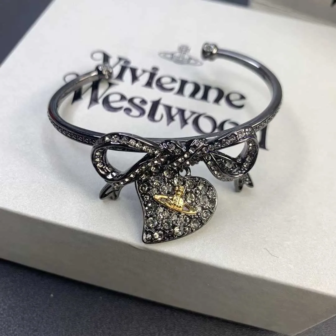 Brand High Version Westwood New Black Bow Love Saturne Bracelet Personnalisé Nail de lot de style cool personnalisé